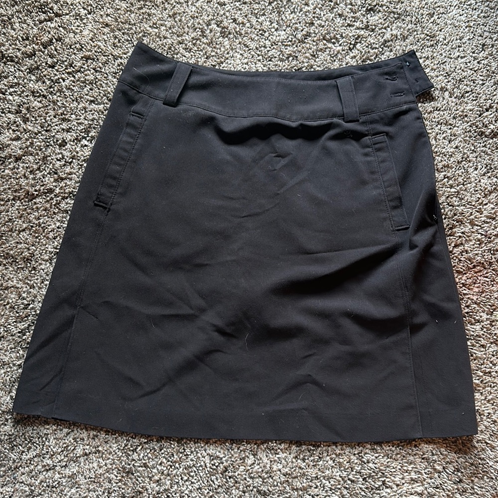 Sport Haley, women’s black skort, size 4.